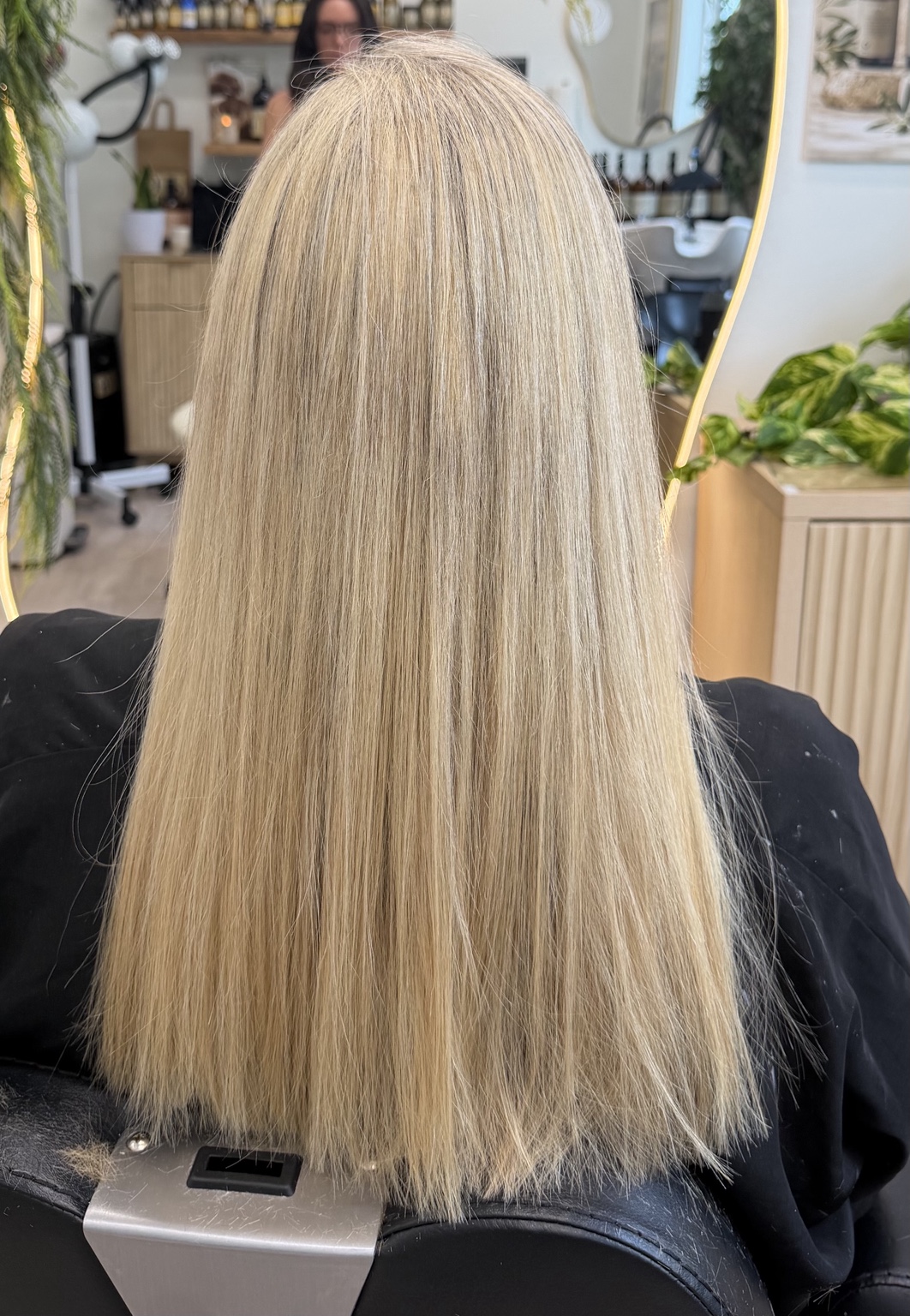 Long blonde hair after a salon appointment with Paula