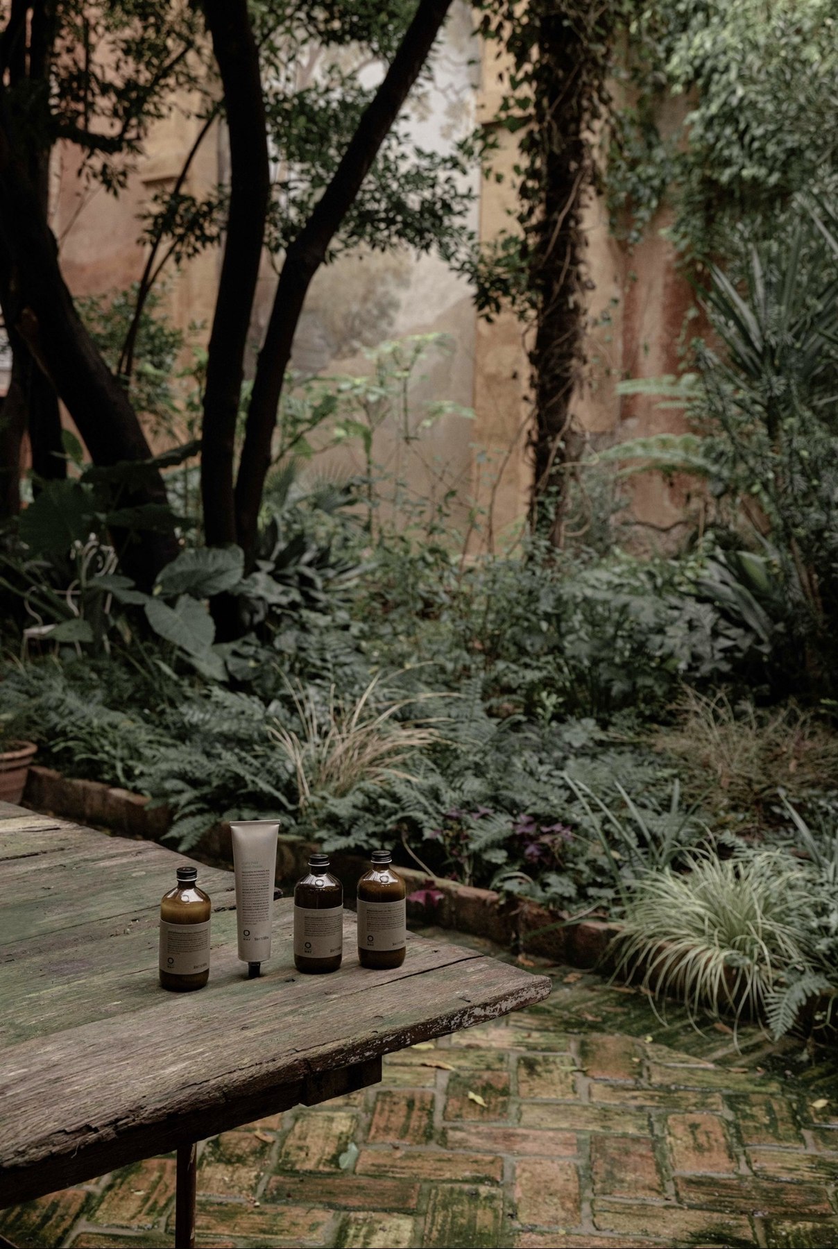 OWAY products displayed in a garden setting